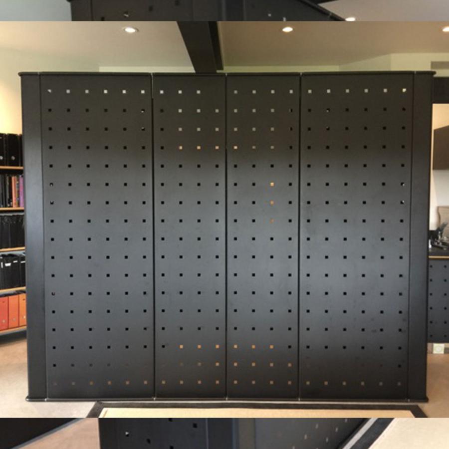 Black metal panels for freestanding or wall display in multiple configurations.